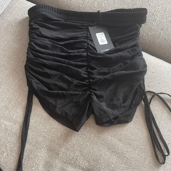 Cover up swim shorts with tags - Picture 3 of 5